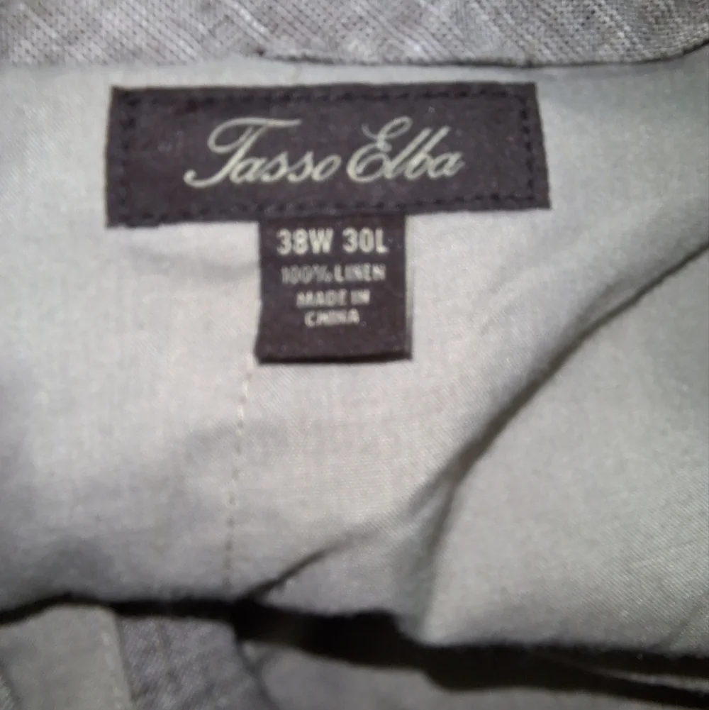 A pair of Tasso Elba 100% brown linen mens panta in a size 38x30. Pre-loved